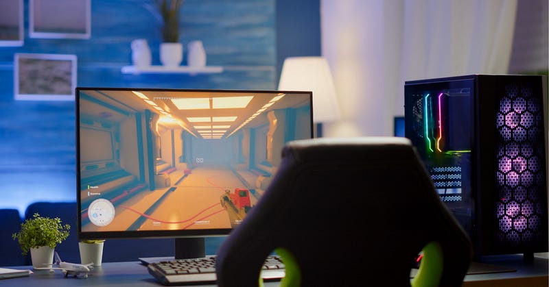 A dedicated game developer working late at night, surrounded by glowing screens filled with code, game assets, and creative sketches — capturing the passion and intensity of the gaming industry.